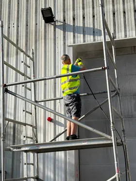 workman on scaffolding